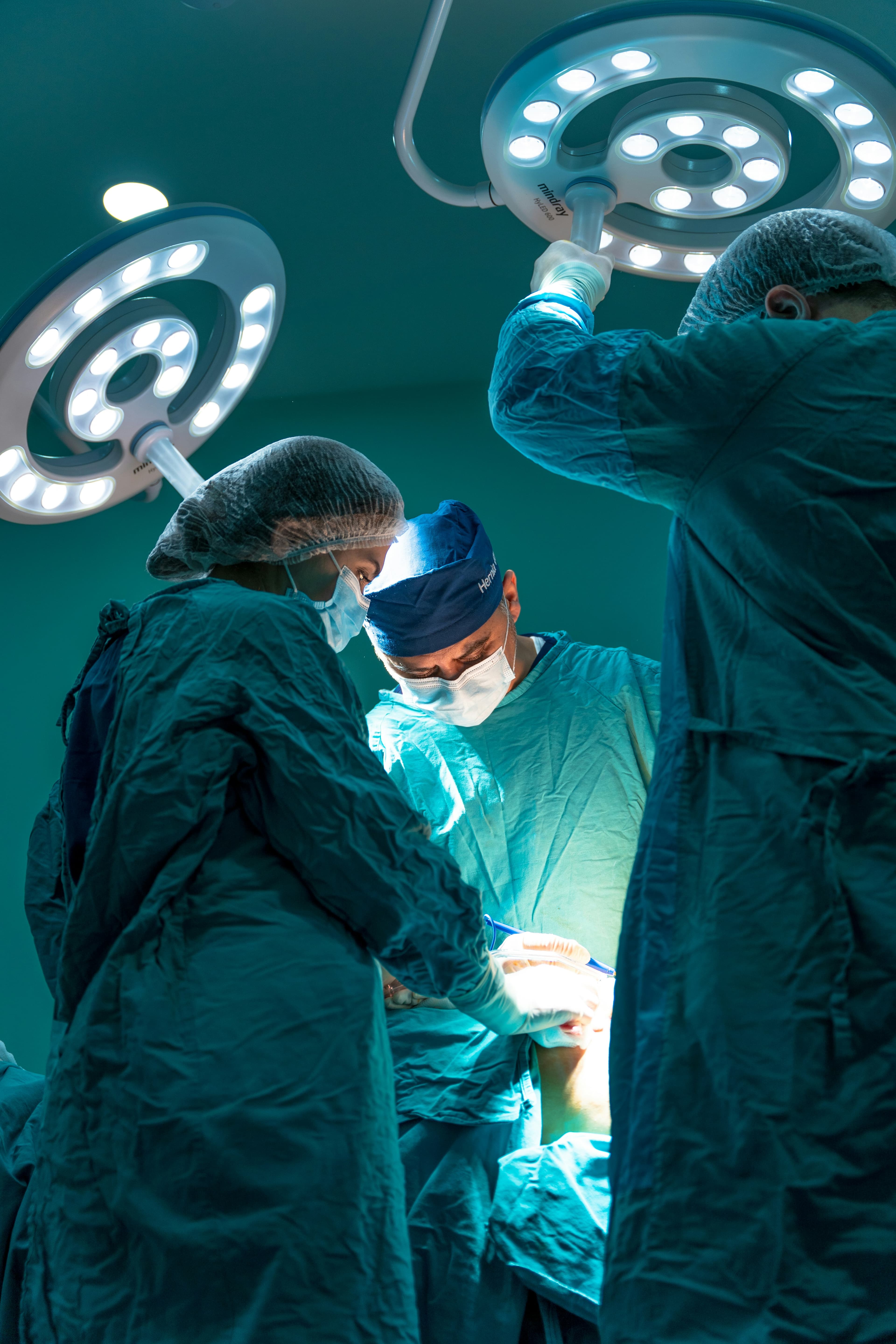 Surgeons performing surgery