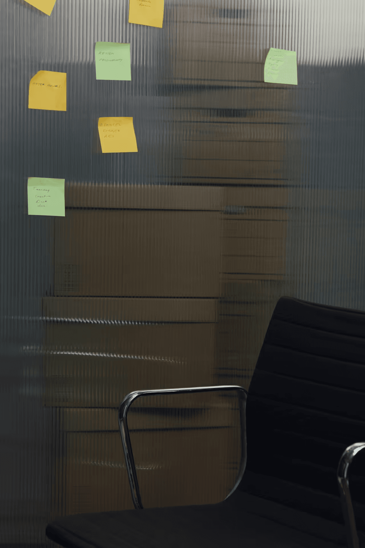 stick notes on a glass wall.png