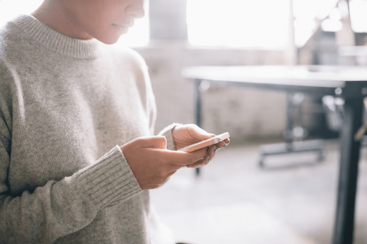 woman looking at a phone.png